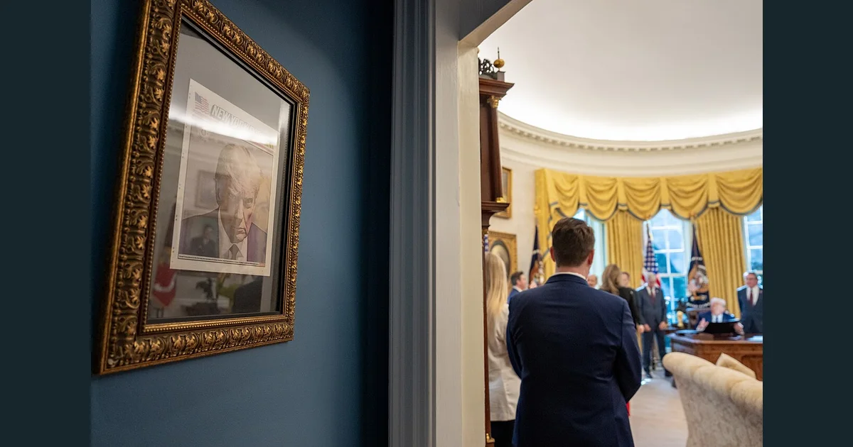 Donald Trump's mug shot hangs in the White House.jpg