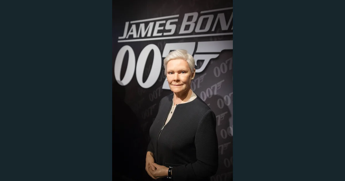 Madame Tussauds wax figure of Judi Dench as M (James Bond).jpg